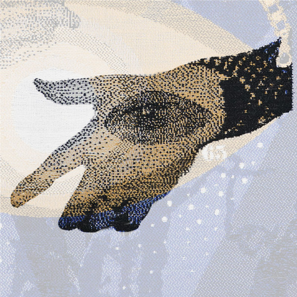 Zoomed section of the 'The Important Thing Is That You Care' tapestry panel which highlights a cradling hand.