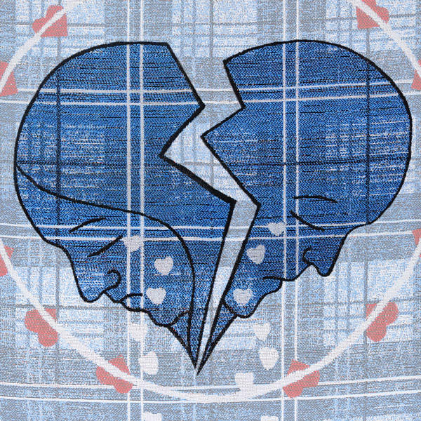 Zoomed section of the Broken Hearts tapestry panel which highlights a the heart, split down the middle